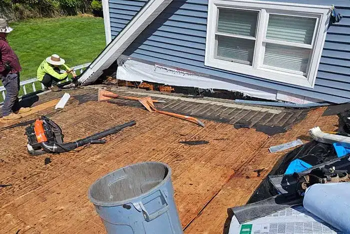 Roof repair and inspection in progress